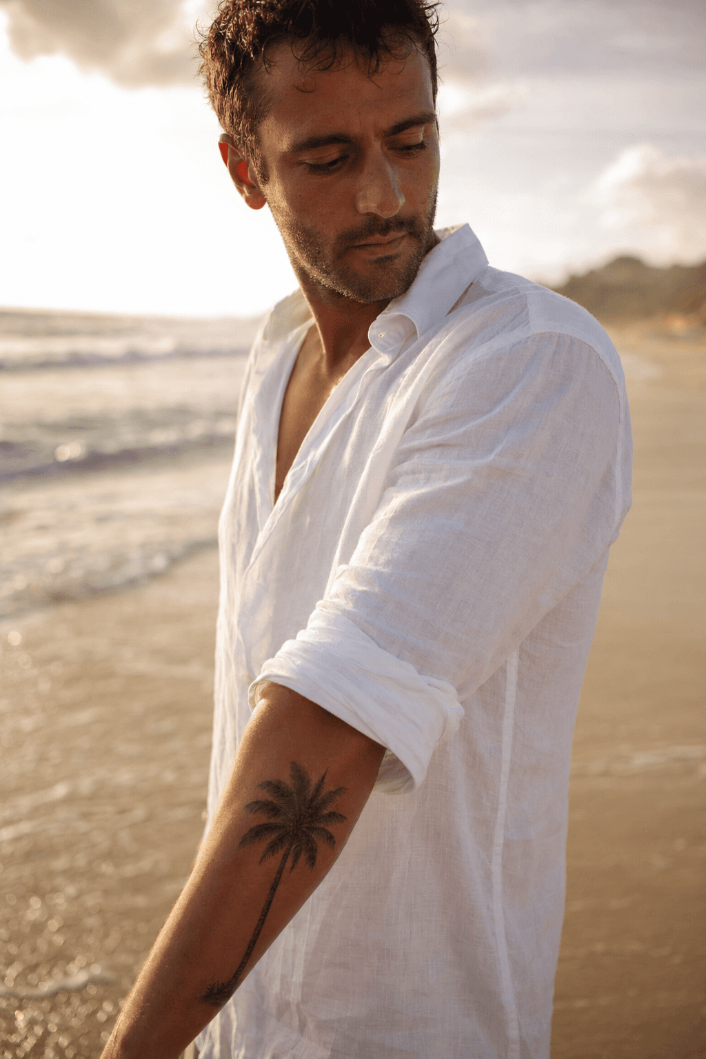 Tatouage homme été : Palmier réaliste avant-bras