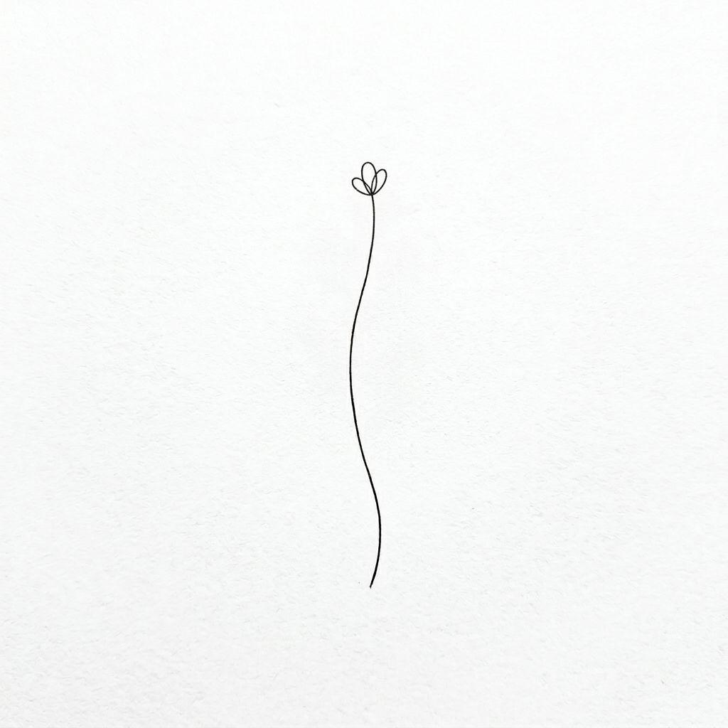 idée tatouage doigt branche florale fine